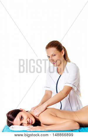 Woman having massage of body in the spa salon. Beauty treatment concept.