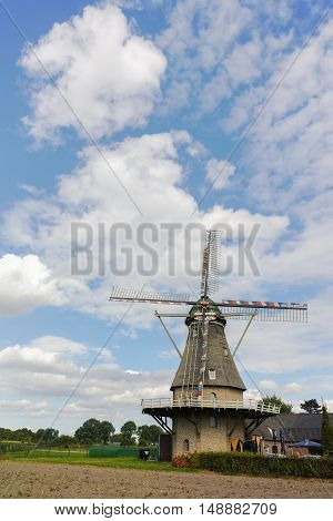 Typical Dutch landscape - flour windmill near Veldhoven North Brabant