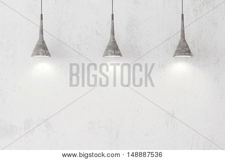 Industrial pendant lamps against rough wall, loft style