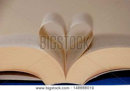 Love books.book pages in the shape of a heart. I like to read, reading.