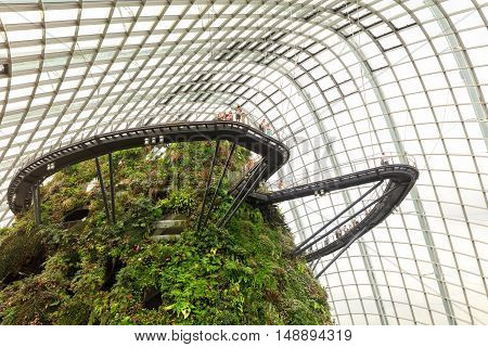 Singapore, Republic of Singapore - May 5, 2016: tourists exploring Cloud Garden conservatory greenhouse