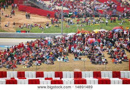 Spectators on tribunes on The Formula 1 Grand Prix