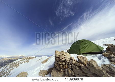 Camping on the top of the mountain in winter.