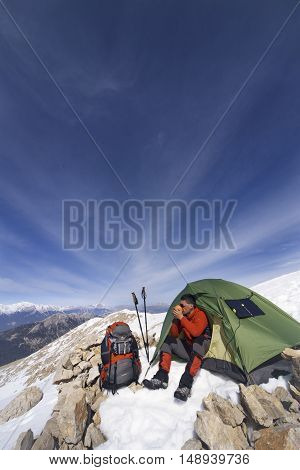 Camping on the top of the mountain in winter.