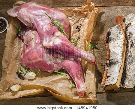 Raw Lamb Shank  On A Wooden Board.