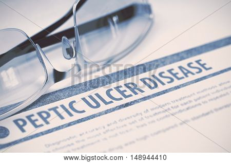 Peptic Ulcer Disease - Printed Diagnosis with Blurred Text on Blue Background with Eyeglasses. Medicine Concept. 3D Rendering.