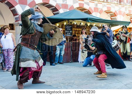 Badajoz Spain - September 23 2016: Arabics warriors fighting in celebration of Almossassa Badajoz Extremadura Spain