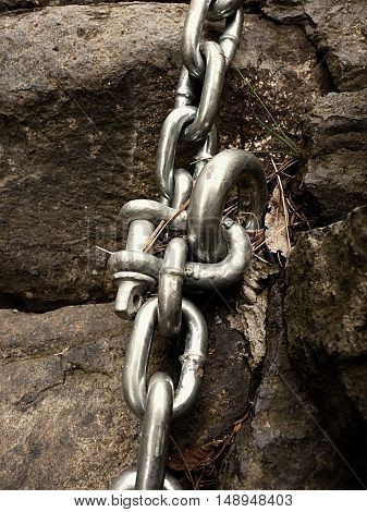 Detail Of Steel Bolt Anchor Eye In Sandstone Roc Hold Steel Chain.