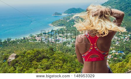 Young Beuatiful Girl is Sitting on Koh Tao Island View to Sairee Beach and Nang Yuan Island