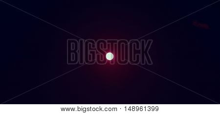 full moon with clear sky image.(red tone)