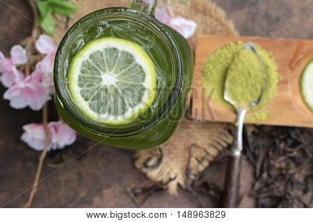Iced green tea with lemon and matcha tea powder