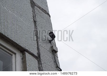 Video camera security system on the wall of the school