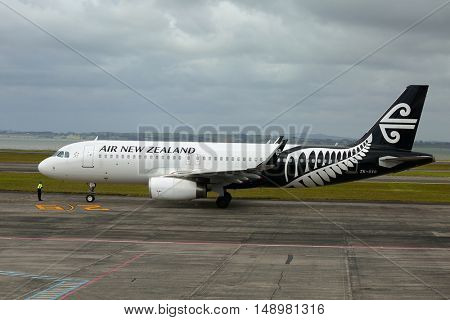 AUCKLAND, NEW ZEALAND - MARCH 7, 2016: Air New Zealand Airbus A320 airliner ready for departure at Auckland International Airport
