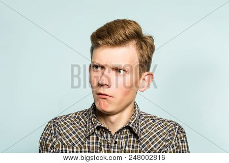 Amazed Astonished Shocked Dazed Impressed Stunned Man Looking Sideways. Portrait Of A Young Guy On L