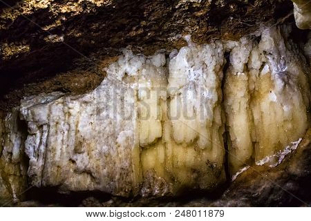 Illuminated Multicolored Stalactites In Cave Han-sur-lesse In Belgium