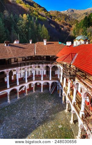 Rila, Bulgaria - October 27, 2017: Rila Monastery View With Autumn Mountain Trees At Background