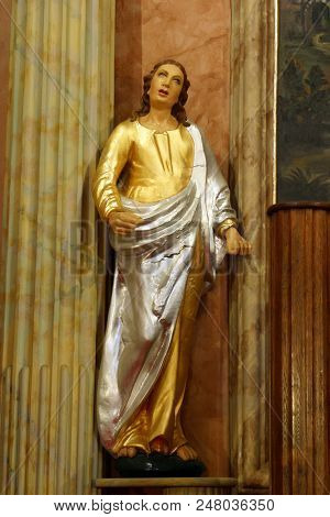 ZACRETJE, CROATIA - AUGUST 06: Saint John, statue on the main altar in the Parish Church of the Holy Cross in Zacretje, Croatia on August 06, 2017.