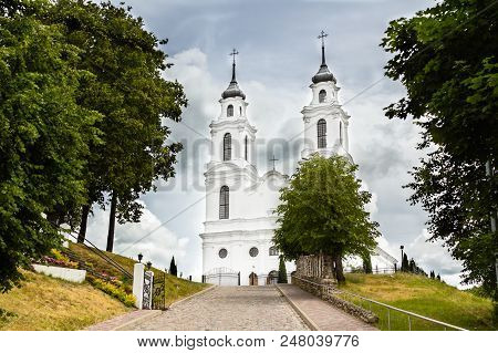 The Catholic Church In Ludza, Latvia In Summer Cloudy Day