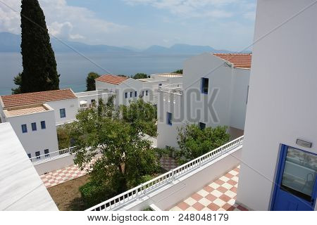 Lefkada, Greece - May 11, 2013: View Of The Territory Of A Modern Hotel With White Buildings And Blu