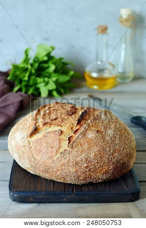Fresh Homemade Bread On A Gray Background. Crisp. French Bread.  Bread At Leaven. Unleavened Bread. 
