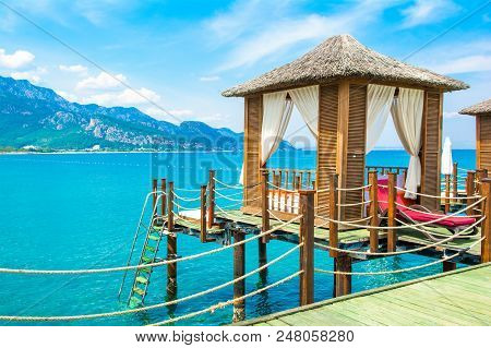 Wooden Beach Pavilions On The Shore Of A Sandy Beach - The Mediterranean Coast, Beldibi, Antalya, Tu