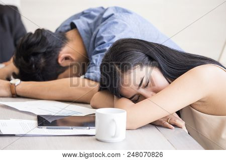 Asian Woman Sleeping With Team, Team Connot Work With Together, Business Overtime Concept, 20-30 Yea