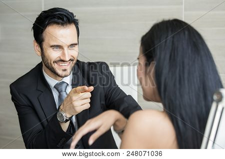 Man Discussing With Woman For Project With Attractive Smiling  At Office. Businessman With Happy Emo