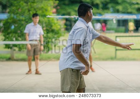 Happiness Students Play Sepak Takraw In The Afternoon.