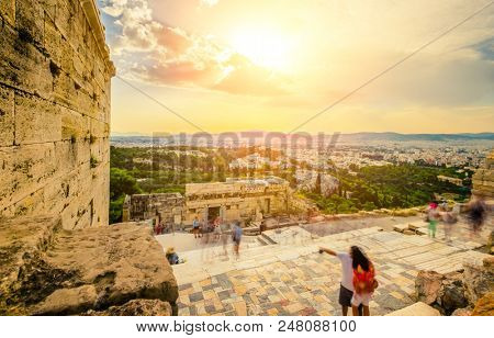 Tourist near the the entrance to Acropolis, Athens, Greece