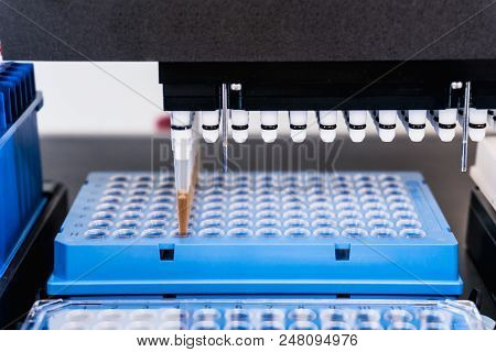 Automation In The Clinical Laboratory. Pipetting Robot Laboratory. Medicine Robotics. Ngs Dna Diagno
