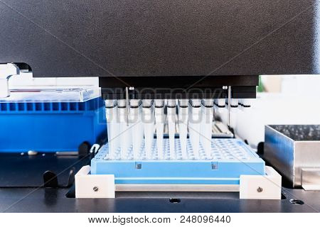 Automation In The Clinical Laboratory. Pipetting Robot Laboratory. Medicine Robotics. Ngs Dna Diagno
