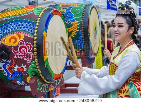 Seoul - May 11 : A Woman Drumming In A Drum At Jogyesa Temple During Lotus Lantern Festival In Seoul