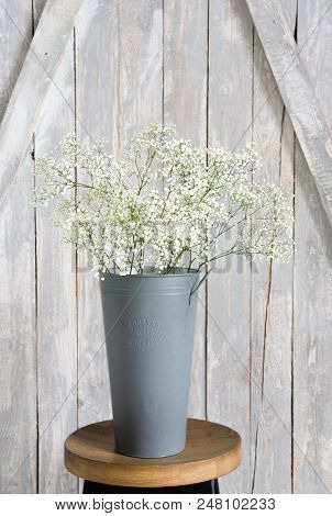 Soft Home Decor, Small Vases With Baby's Breath Bouquet. Interior.