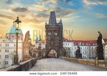 View Of Charles Bridge In Prague During Sunset, Czech Republic. The World Famous Prague Landmark