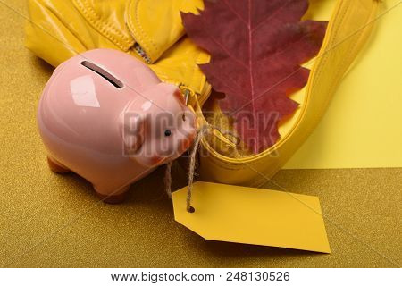 Sale And Discount Concept. Sale, Discount, Price. Purse, Bag, Clutch On Yellow Background. Female Li