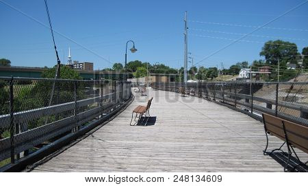 Walking Bridge With Benches Located In Koekuk, Iowa