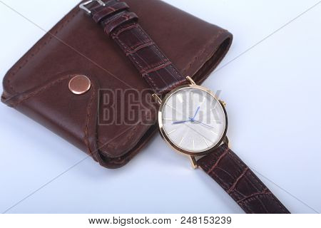 Men's Accessories For Business And Rekreation. Leather Wallet, Watch And Smoking Pipe On White Backg