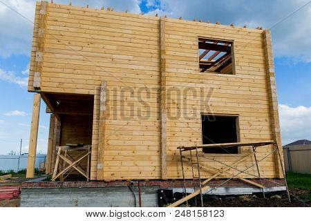 Construction Of A House Made Of Laminated Lumber. The Frame Of The House. Cottage Made Of Laminated 