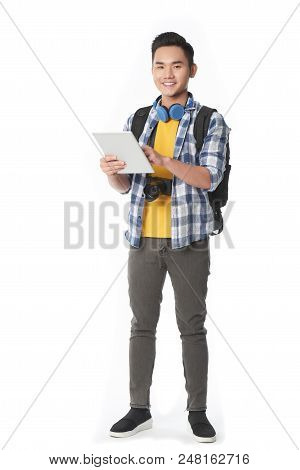 Young Smling Vietnamese Tourist Using Map Application On Digital Tablet