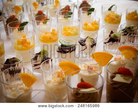 Wedding Cakes Set On Glass Shelf Minicake