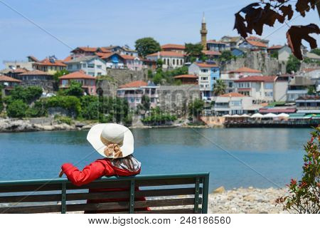 A tourist enjoys amazing view of Historical Amasra - Amasra town, Bartin - Turkey