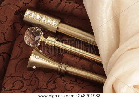 Metal Ending For Cornices And The Folded Fabric. Curtain Rod And Finials On The Folded Fabric