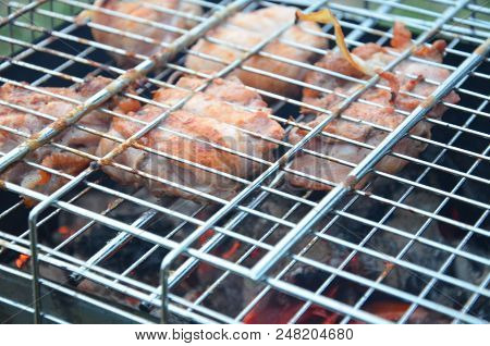 Preparation On Bbq. Dish With Roasted Meat On Abstract Background. Hot Tasty Smokey Barbecue Meal At