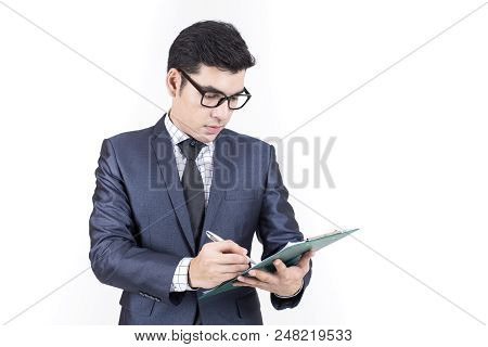 Asian Businessman Show Chart On White Background With Success Feeling, Business Presentration Concep