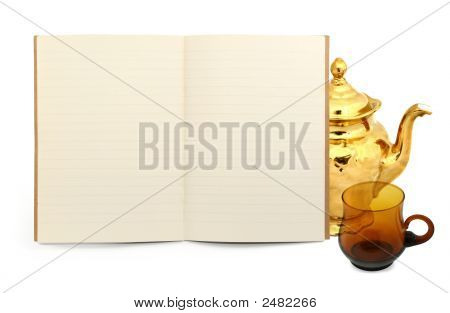 Buch mit einer Teekanne und eine Tasse