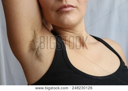 Female Hairy Armpit, Unshaved Underarms New Fashion Trend Concept.