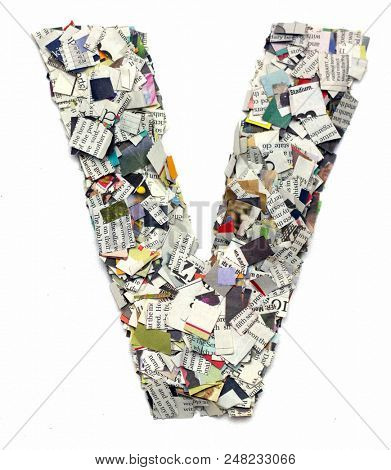 Letters made from newspaper capitel V isolated on white 
