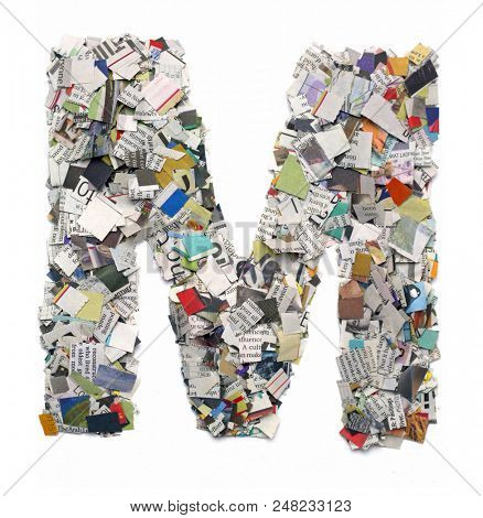 Letters made from newspaper capitel M isolated on white 