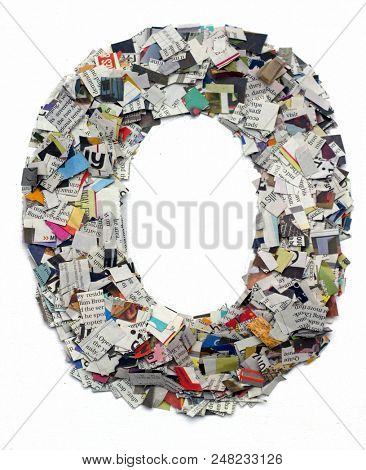 Letters made from newspaper capitel O isolated on white 
