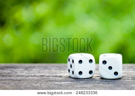 White Dice On A Green Blurry Background, Playing Dice Macro Photos